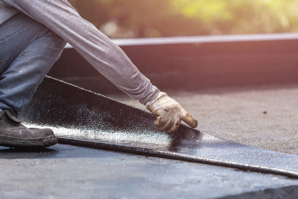 Professional Waterproofing technician working in Newtown, OH